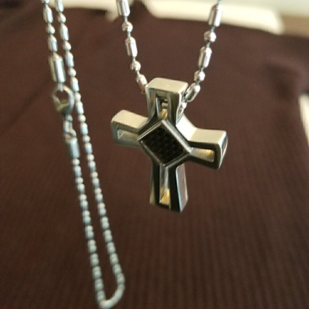 Chisel stainless steel polished cross pendant with a grey carbon fiber inlay